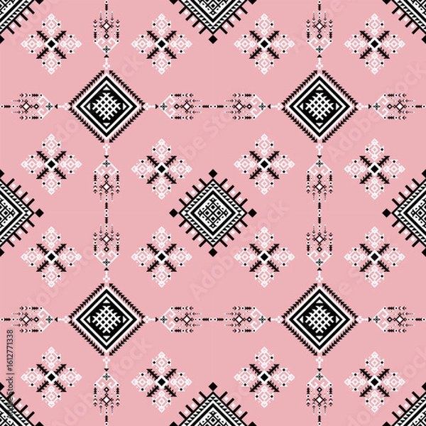 Obraz A seamless geometric pattern featuring intricate black and white diamond shapes on a pink background, creating a modern, tribal-inspired design.
