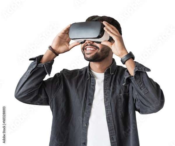 Fototapeta Young man using virtual reality headset isolated in transparent PNG, VR, future, gadgets, technology concept