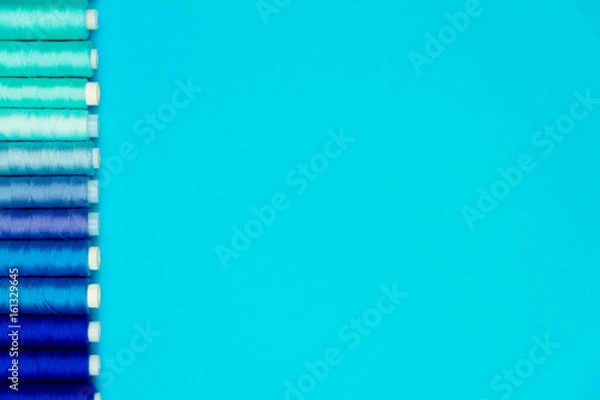 Fototapeta Sewing concept. Colorful sewing spools