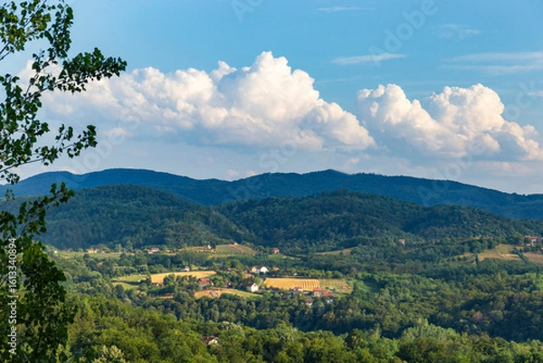 Fototapeta Clouds over low mountains, Balkan landscape