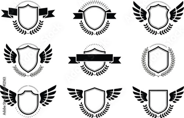 Fototapeta Collection of black and white shield emblems with wings, banners, and laurels