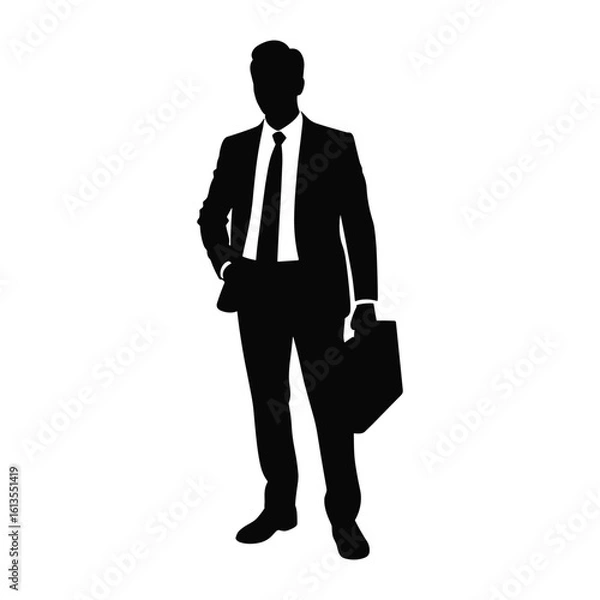 Obraz Silhouette of a businessman in a suit holding a briefcase