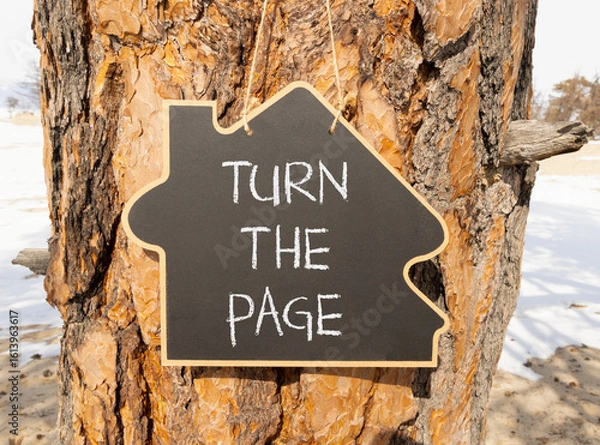 Fototapeta Turn the page symbol. Concept words Turn the page on beautiful blackboard. Beautiful old tree and sand beach background. Business motivational lifestyle turn the page concept. Copy space.