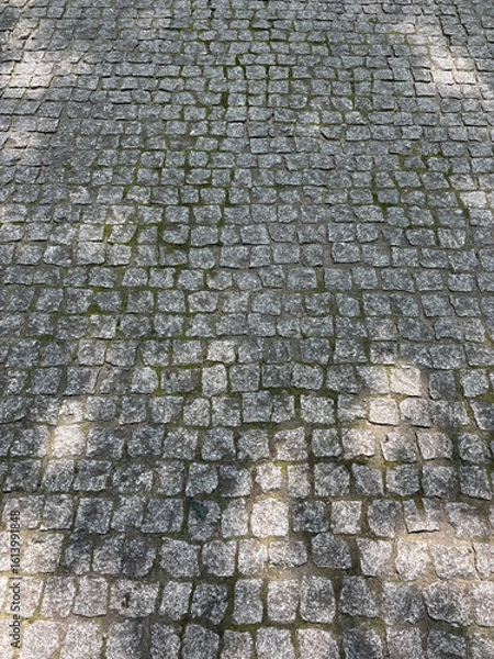 Obraz Old cobblestone road, pavement with rough textured stones