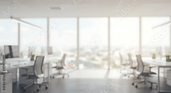 Fototapeta Blurred modern office interior with large windows and bright daylight. Abstract business background concept.