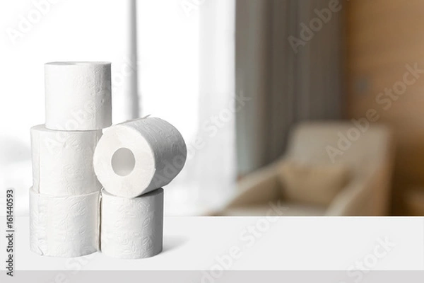 Fototapeta Toilet paper on  board