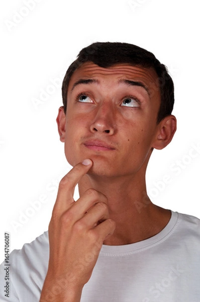 Fototapeta pensive look up, portrait of a young man on a white background