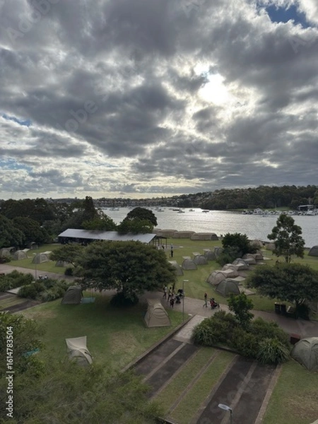 Obraz View of glamping tents on the ground next to the harbour, Cockatoo Island, Sydney, Australia