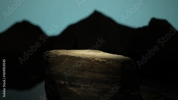 Fototapeta Stone cylinder reflected in water-like floor under soft dramatic lighting