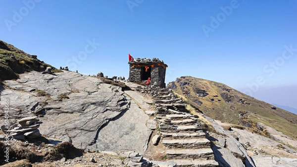 Obraz Ancient, small stone temple ruin spotted during a trek in Tungnath, Chopta, Rudraprayag, Uttarakhand, India.
