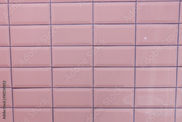 Fototapeta Series of Smooth, Glossy Pink Ceramic Tiles Forming a Uniform Pattern, Creating a Calming Aesthetic for Interior Spaces or Home Designs