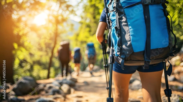Fototapeta Person with a backpack embarking on an outdoor adventure through a scenic trail surrounded by nature