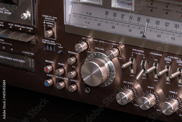 Obraz Vintage Audio Stereo Gear Setup Copper Front Panel with Multiple Controls Including Display, Knobs, Buttons, Keys, Switches