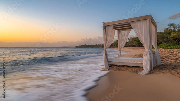 Fototapeta Beautiful bed placed on the beach offering a relaxing spot for enjoying the ocean breeze