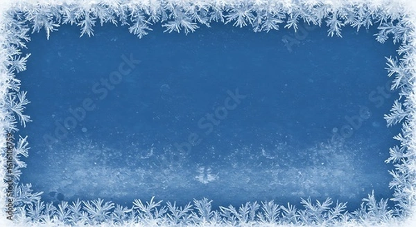 Fototapeta A blue background framed by intricate frost patterns, creating a wintery border effect with delicate ice crystals and a cool, serene aesthetic.