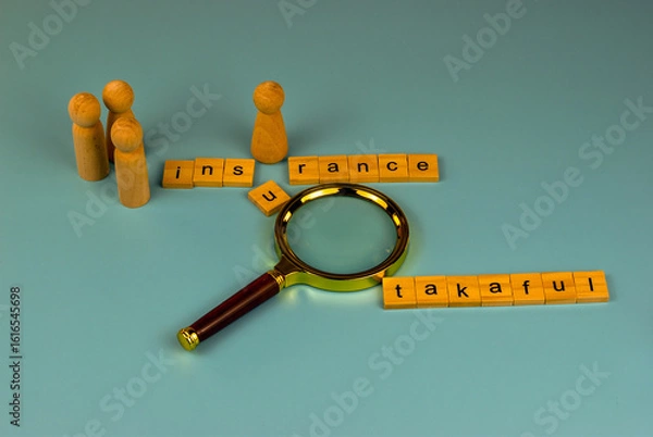 Fototapeta A magnifying glass examines the connection between income and insurance