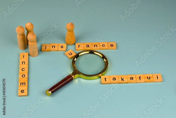 Fototapeta A magnifying glass examines the connection between income and insurance