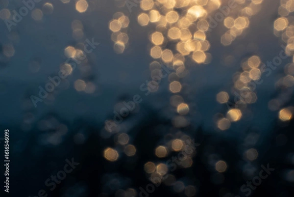 Obraz Golden light refracts through water