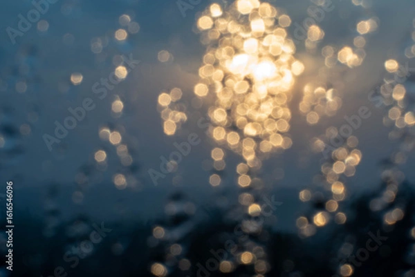 Obraz Golden light refracts through water