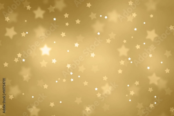 Fototapeta Beautiful blurry star shape bokeh background. Christmas and New Year Holidays copy space greeting card. Lovely gold colored Xmas illustration.