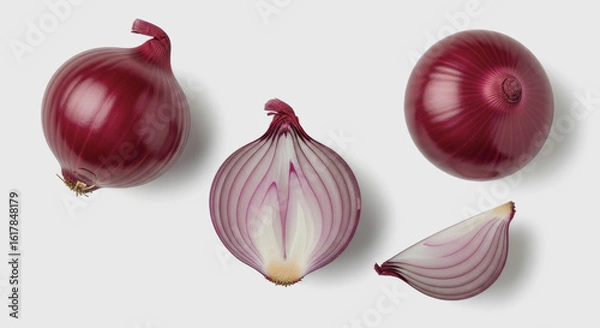 Obraz Four red onions whole halved and quartered on a white surface.