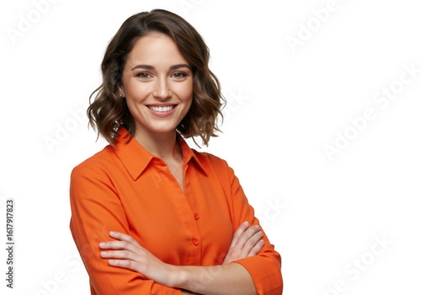 Fototapeta Smiling woman in orange shirt with arms crossed isolated on transparent background