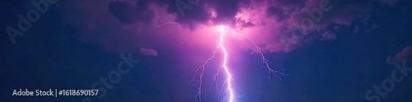 Obraz Dramatic Lightning Strike Illuminates Night Sky During Powerful Thunderstorm