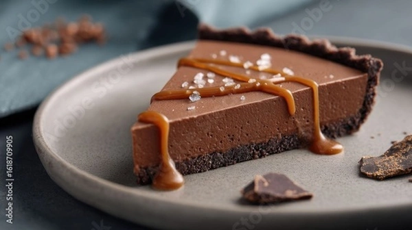 Fototapeta Slice of chocolate tart with caramel.