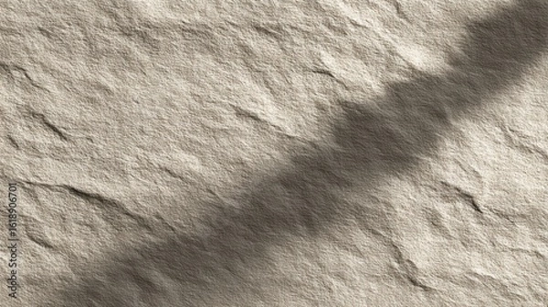 Fototapeta Textured Stone Surface Shadow Play Light and Dark Tones,