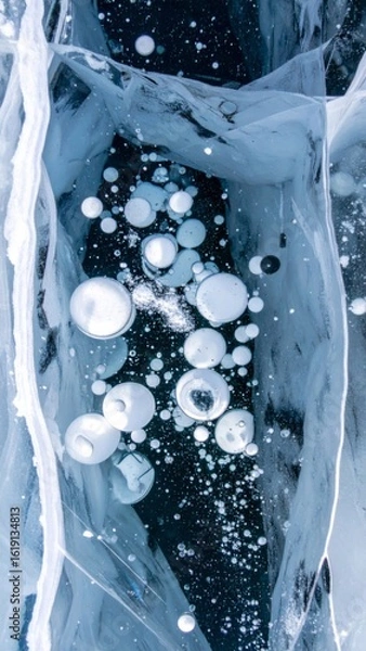 Fototapeta Frozen Methane Bubbles Trapped Underneath Clear Ice Surface on Winter Lake Cold