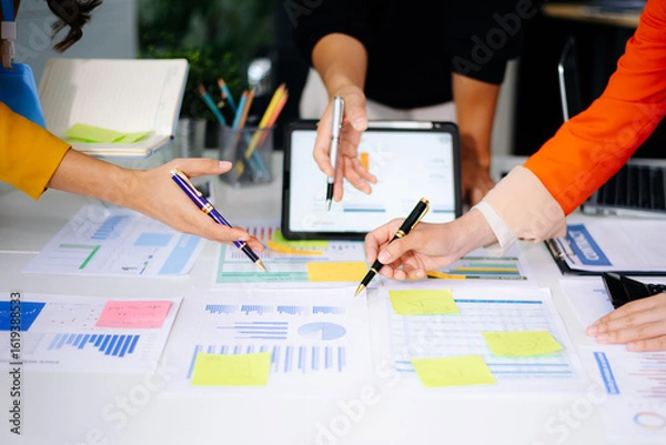 Fototapeta Business documents on office table with smart phone and calculator digital tablet and graph business with social network diagram