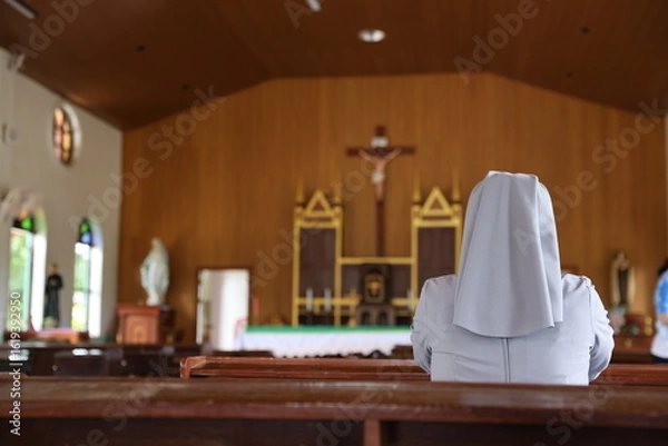 Fototapeta Landscape size picture of the interior of an empty roman catholic church