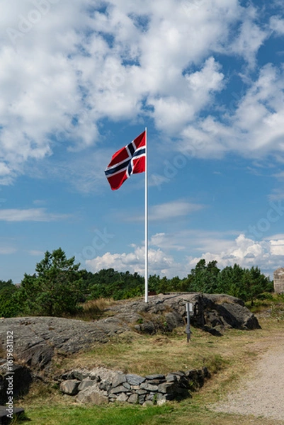 Fototapeta Norwegian flag at Vestagdermuseet in Kristiansand in Norge
