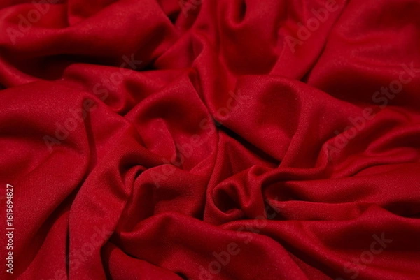 Obraz Red fabric background. Selective focus. Red cloth waves background texture.