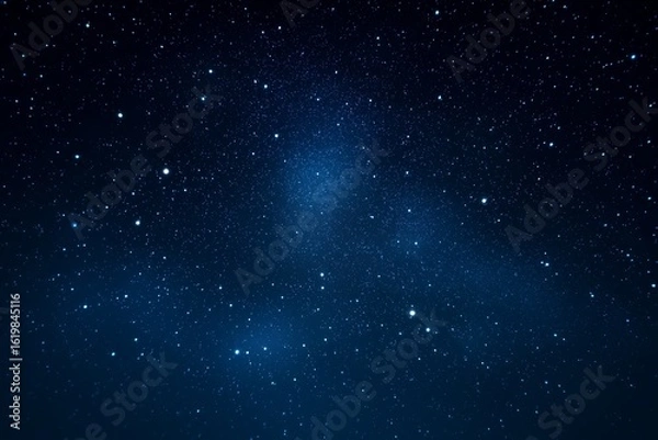 Fototapeta Star-filled dark blue night sky symbolizing the vastness of space and evoking a sense of wonder, mystery, and beauty, captured in a serene and expansive cosmic atmosphere with minimal light