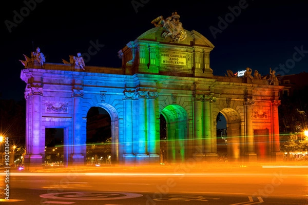 Obraz Alcala Gate in Madrid Celebrating World Pride Week Illuminated in Raainbow Colors
