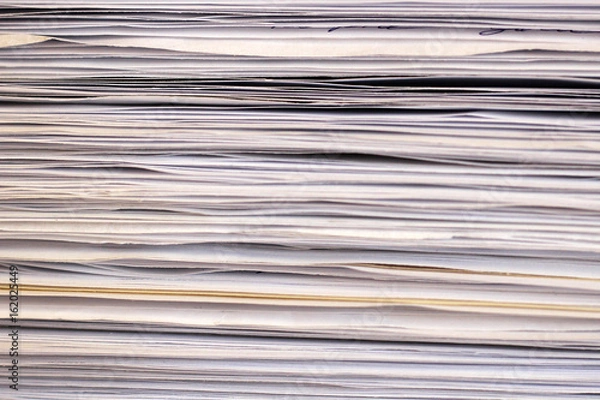 Fototapeta Stack of files full of documents signifying concepts such as work and stress, and business objects.