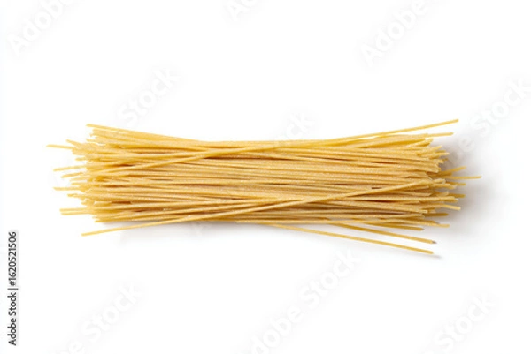 Fototapeta a bunch of spaghetti noodles on a white surface