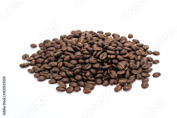 Fototapeta a pile of coffee beans on a white surface