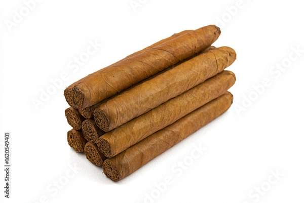 Fototapeta a stack of cigars sitting on top of each other