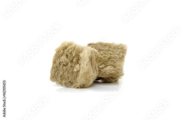Fototapeta Mineral wool for insulation. The fiberglass is isolated on white.