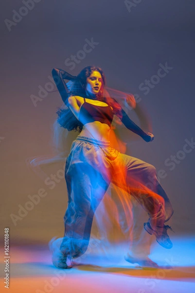 Obraz Jazz Funk Dance Performer in Motion with Vibrant Lighting Modern Urban Choreography and Energy