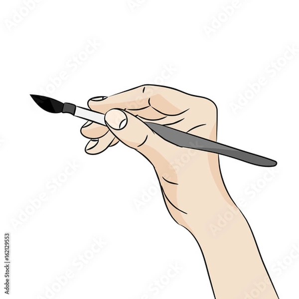 Obraz Hand holding a thin brush on white background