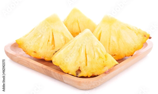 Fototapeta pineapple with slices isolated on white