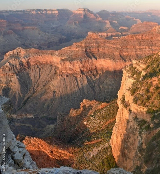 Fototapeta Panorama of the Grand Canyon in Arizona at sunset, showing the Colorado River from the South Rim. 