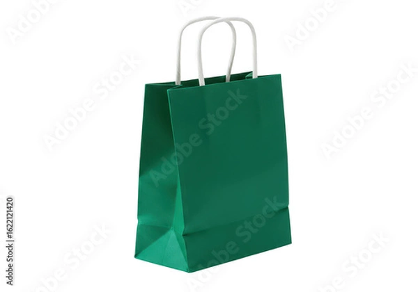 Fototapeta A single vibrant green paper shopping bag with white handles stands upright against a plain transparent background ready for gifts or purchases