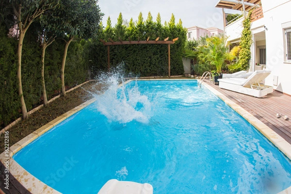 Obraz Splashing water in pool