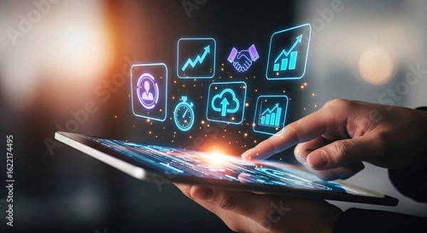 Fototapeta Digital tablet with glowing UI icons for business growth, cloud, and analytics tools