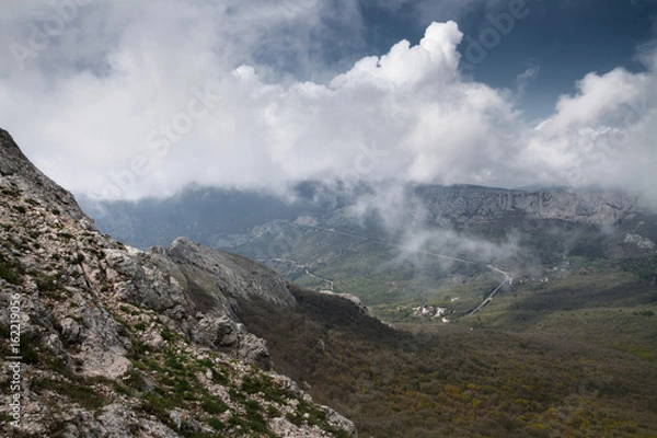 Fototapeta mountains in the clouds