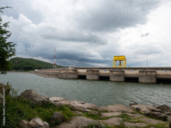 Fototapeta Impressive Dam with Spillway for Power and Irrigation.